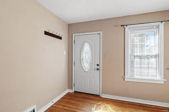 entryway with wood-type flooring