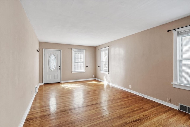 foyer entrance featuring light hardwood / wood-style flooring