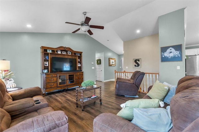 living room with dark wood-type flooring, vaulted ceiling, and ceiling fan