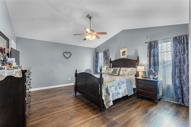 bedroom with ceiling fan, lofted ceiling, multiple windows, and dark hardwood / wood-style flooring