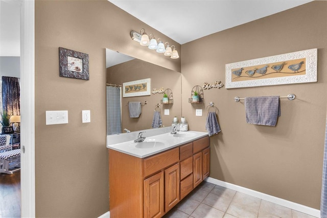 bathroom with vanity and tile patterned floors