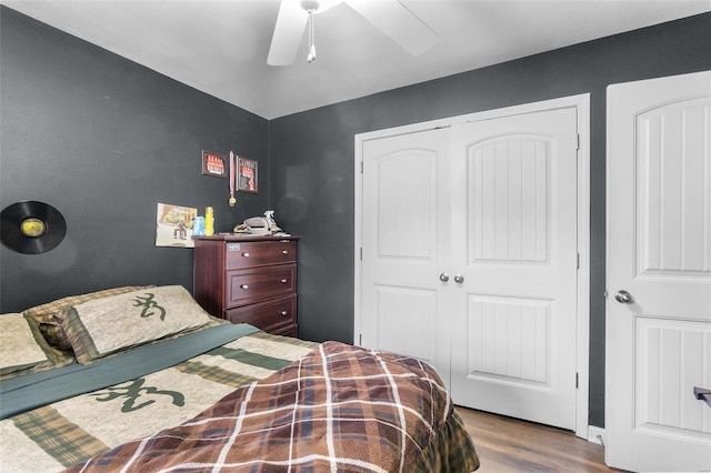 bedroom featuring a closet, ceiling fan, and wood-type flooring