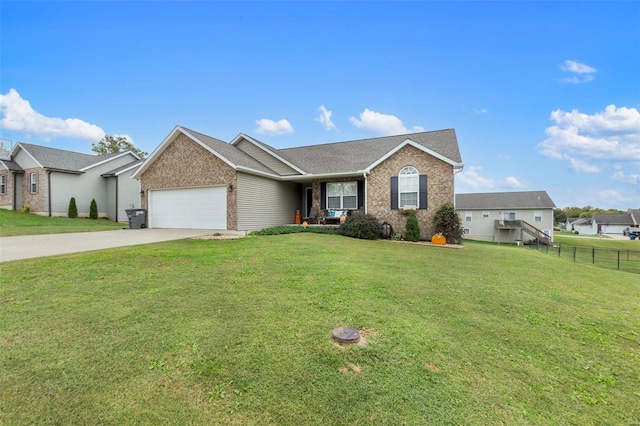 view of front facade with a front lawn and a garage