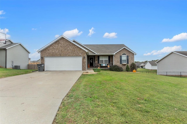 ranch-style house with cooling unit, a front yard, and a garage