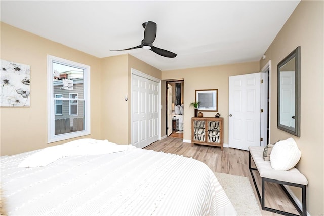 bedroom with ceiling fan and light wood-type flooring