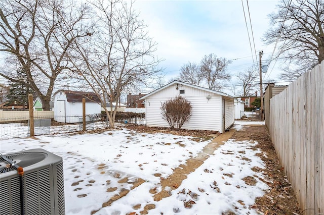 snowy yard with cooling unit