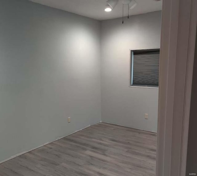 unfurnished room featuring light wood-type flooring