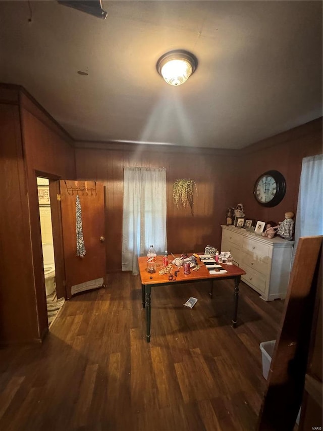 interior space with crown molding and dark hardwood / wood-style flooring