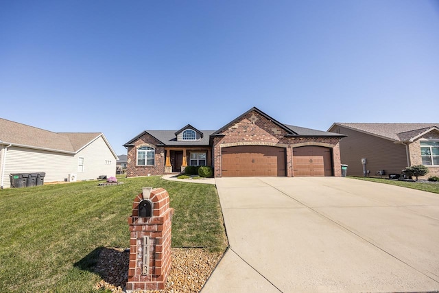 view of front of home featuring a front lawn and a garage