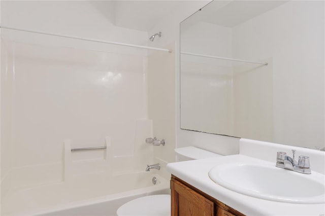 full bathroom with shower / bathing tub combination, vanity, and toilet