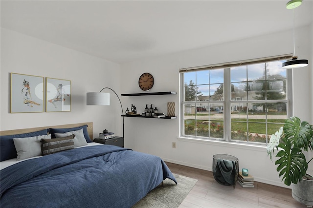 bedroom featuring light hardwood / wood-style floors