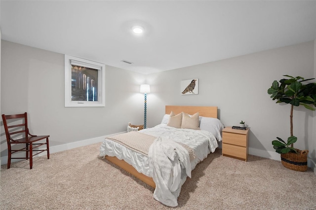 bedroom with light carpet