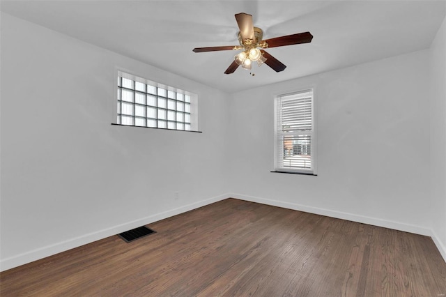 unfurnished room with hardwood / wood-style floors and ceiling fan