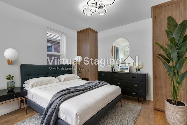 bedroom featuring light hardwood / wood-style floors