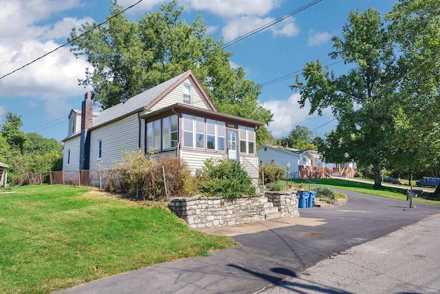 view of front of home with a front yard