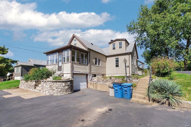 view of front of home with a garage