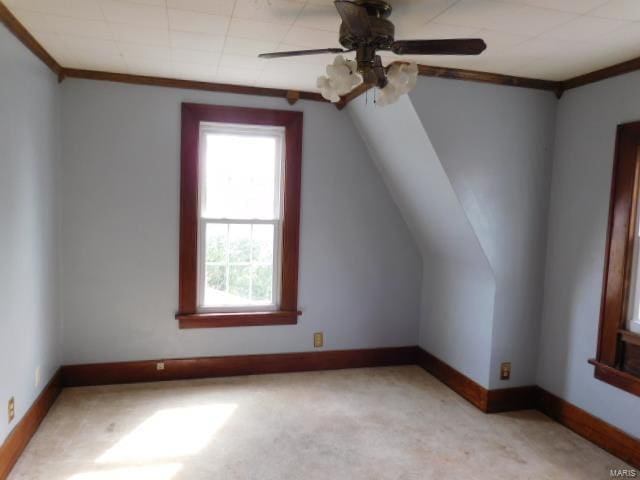 bonus room with lofted ceiling, ceiling fan, and light colored carpet