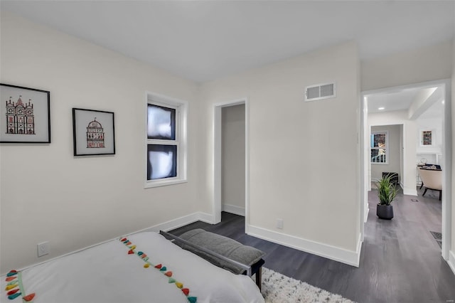 bedroom featuring dark hardwood / wood-style floors