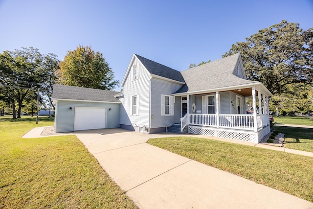 view of front of home featuring a porch, a front yard, and a garage