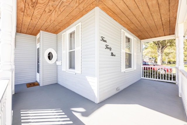 doorway to property featuring a porch