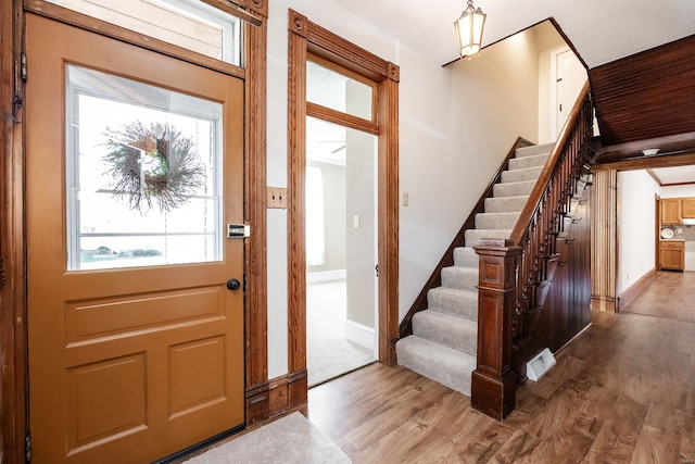 foyer with hardwood / wood-style flooring