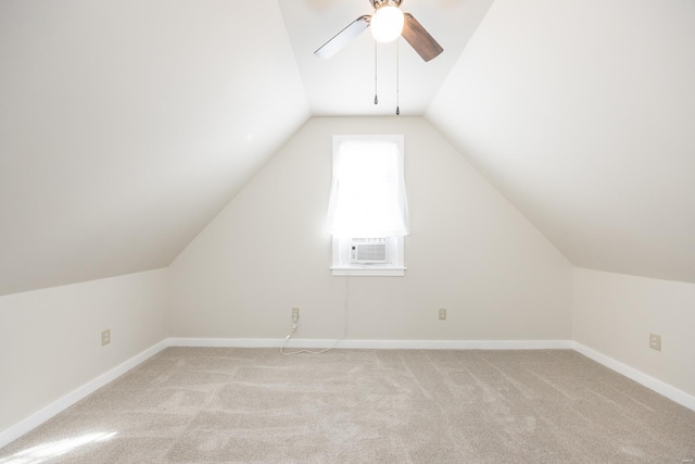 bonus room featuring light carpet, cooling unit, lofted ceiling, and ceiling fan