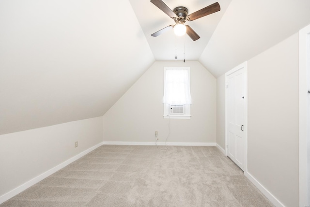 bonus room with ceiling fan, light colored carpet, cooling unit, and lofted ceiling