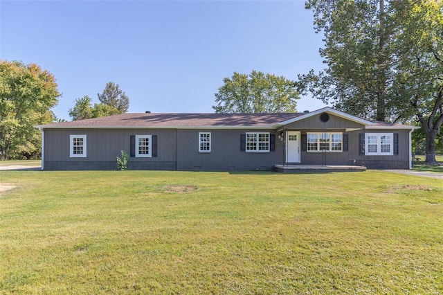 ranch-style house with a front yard