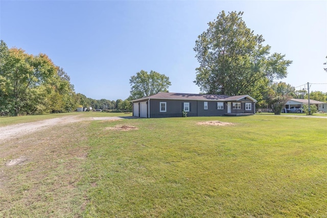 single story home with a front yard