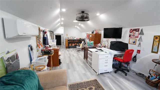 office space featuring light hardwood / wood-style floors and lofted ceiling