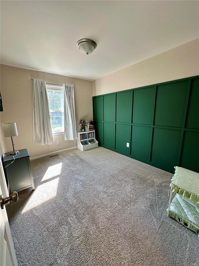 unfurnished bedroom featuring carpet flooring