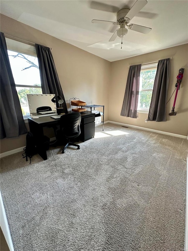 home office featuring carpet floors and ceiling fan