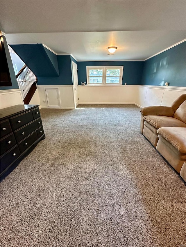 unfurnished living room featuring carpet