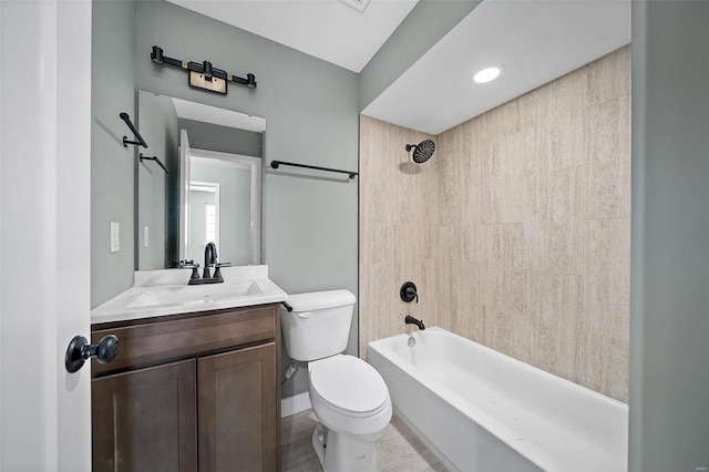 full bathroom with toilet, vanity, and bathtub / shower combination