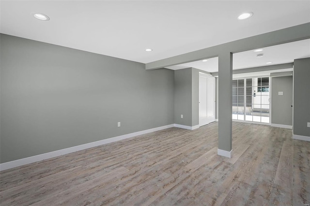 basement featuring light wood-type flooring