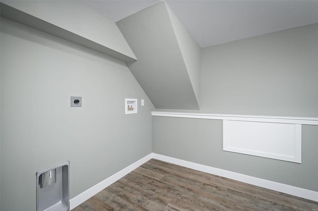 laundry room with hookup for an electric dryer, hookup for a washing machine, and hardwood / wood-style floors