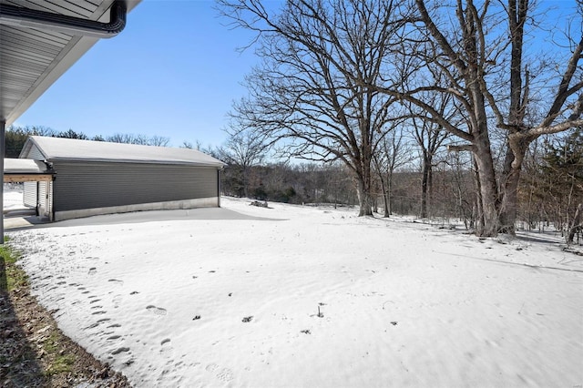 view of yard layered in snow