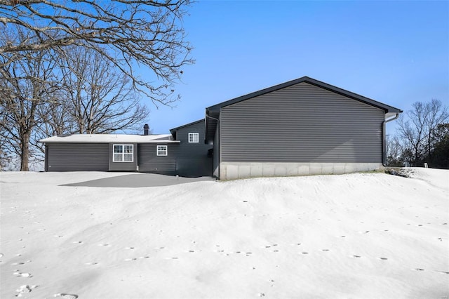 view of snow covered property