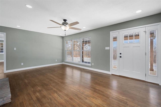 entrance foyer with ceiling fan and dark hardwood / wood-style floors