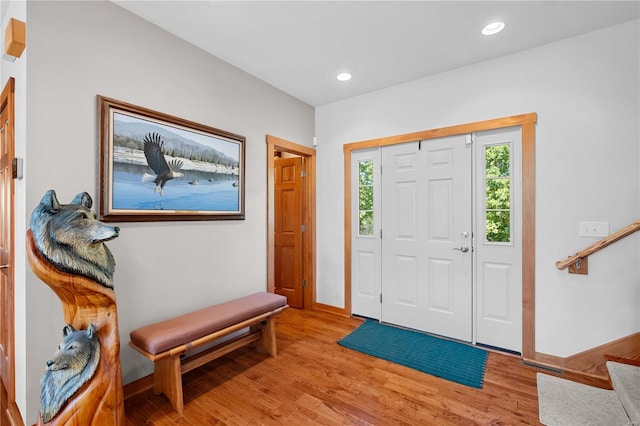 entryway with light hardwood / wood-style flooring