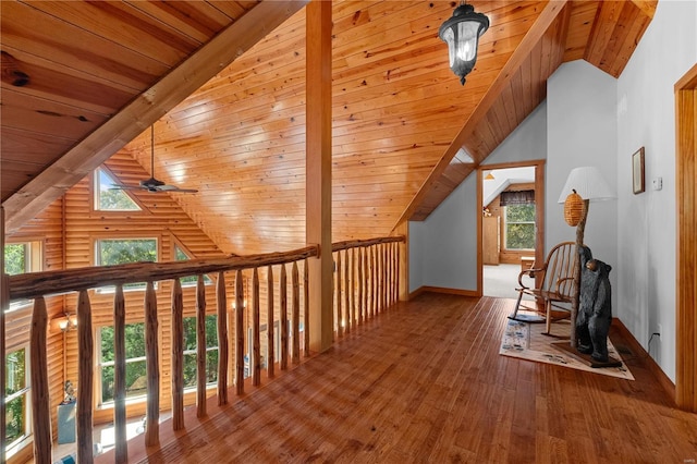 bonus room with wooden ceiling, hardwood / wood-style floors, a wealth of natural light, and ceiling fan