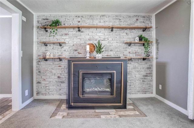 details featuring a fireplace, crown molding, carpet, and a textured ceiling