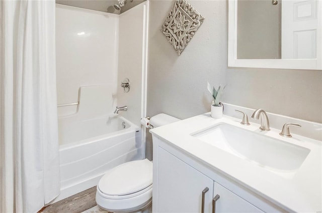 full bathroom featuring vanity, shower / tub combo, toilet, and hardwood / wood-style flooring