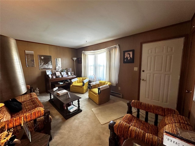 carpeted living room with a baseboard heating unit