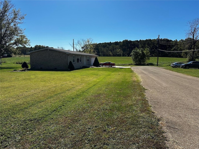 exterior space with aphalt driveway