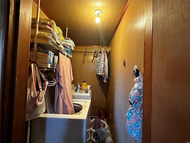 laundry room with wood ceiling, washer / clothes dryer, and laundry area