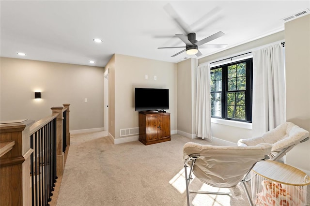 interior space featuring ceiling fan