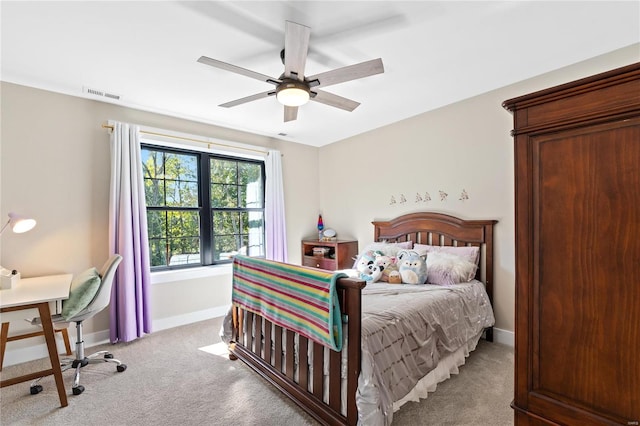 carpeted bedroom with ceiling fan