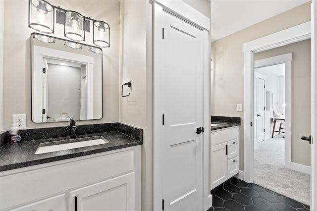 bathroom featuring tile patterned floors and vanity