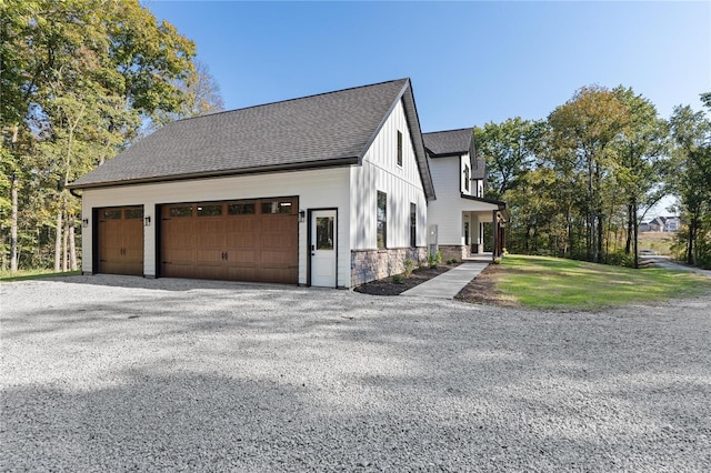 view of side of home with a garage